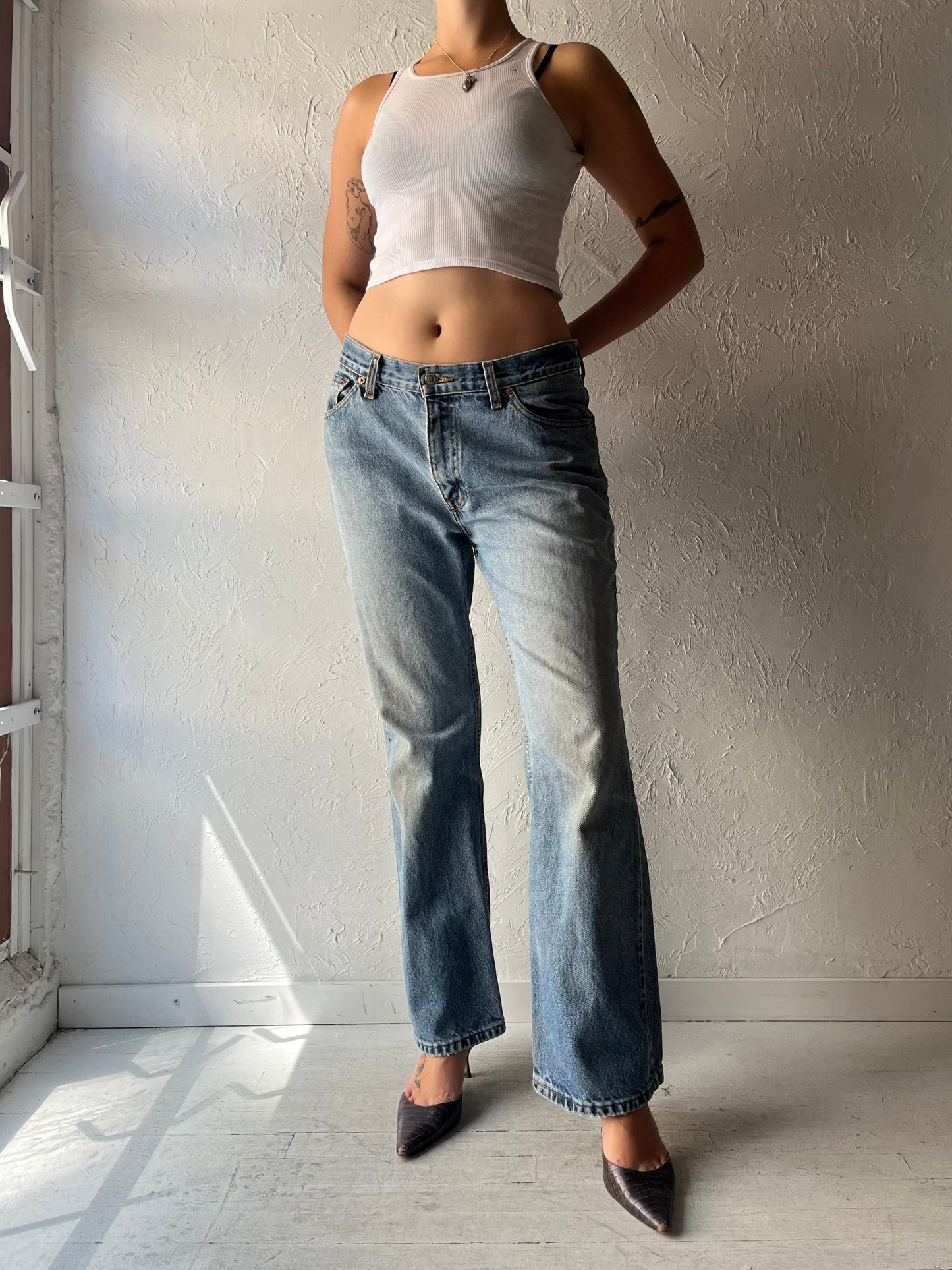 90s 'Levis' Light Wash Denim Mid Rise Jeans / Medium