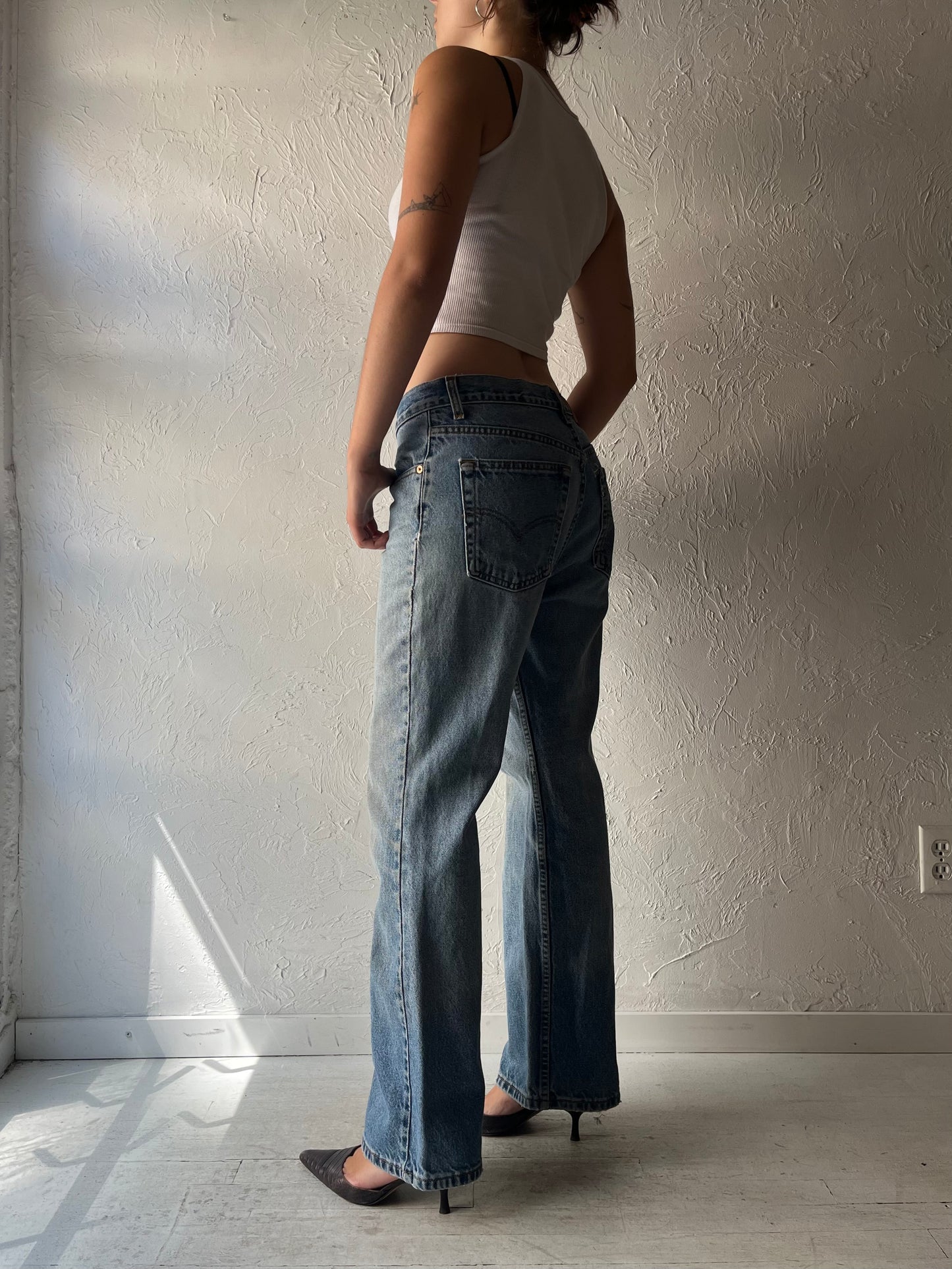90s 'Levis' Light Wash Denim Mid Rise Jeans / Medium