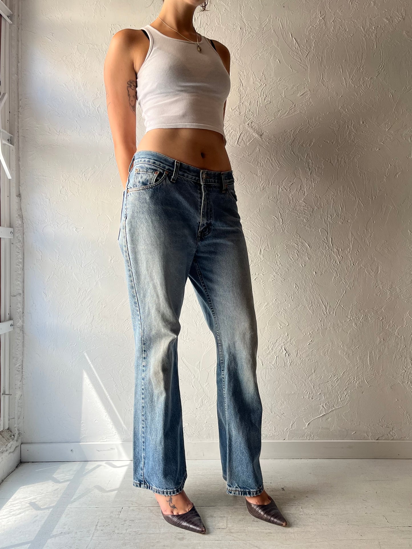 90s 'Levis' Light Wash Denim Mid Rise Jeans / Medium